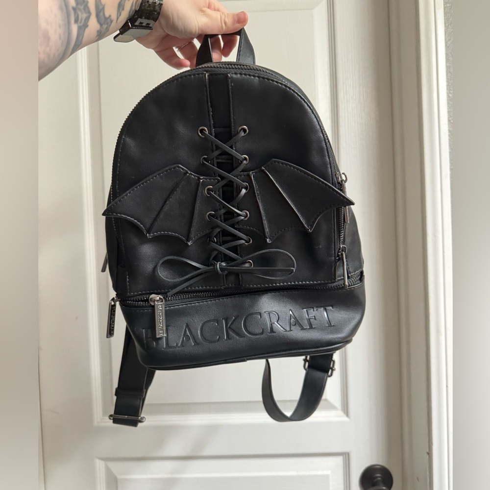 Blackcraft Cult bat wing lace up backpack mini backpack